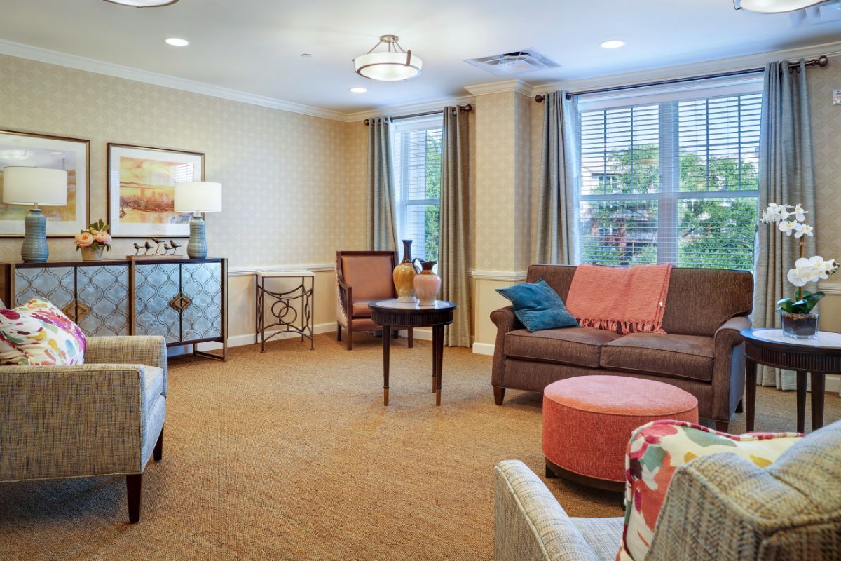 A cozy living room with comfortable seating and elegant decor.