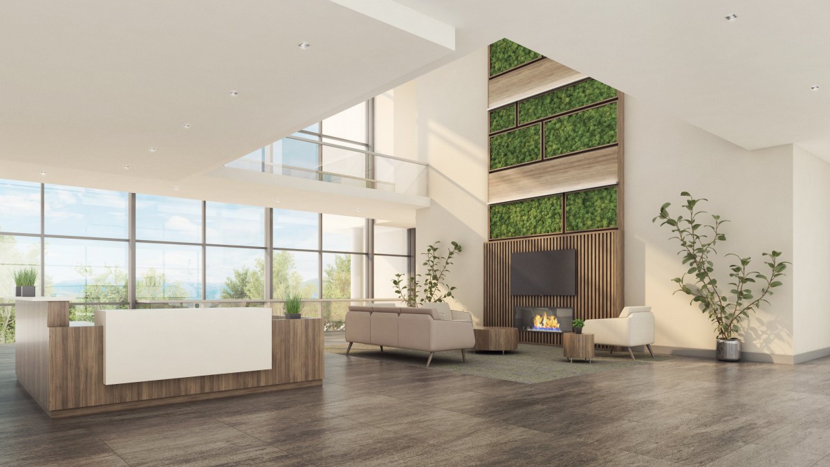 A spacious and modern living room featuring a fireplace, green accent wall, and large windows.