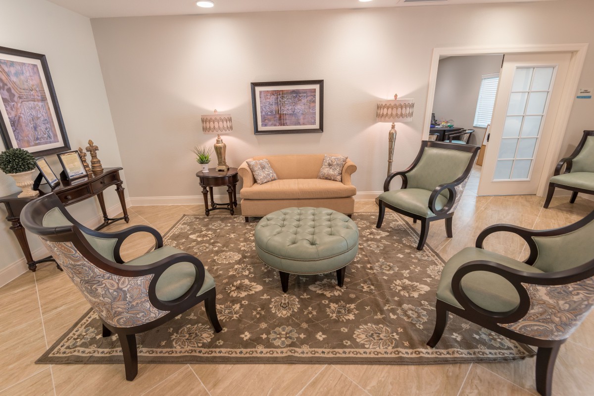 A cozy living room with elegant seating arrangement and classic decor.