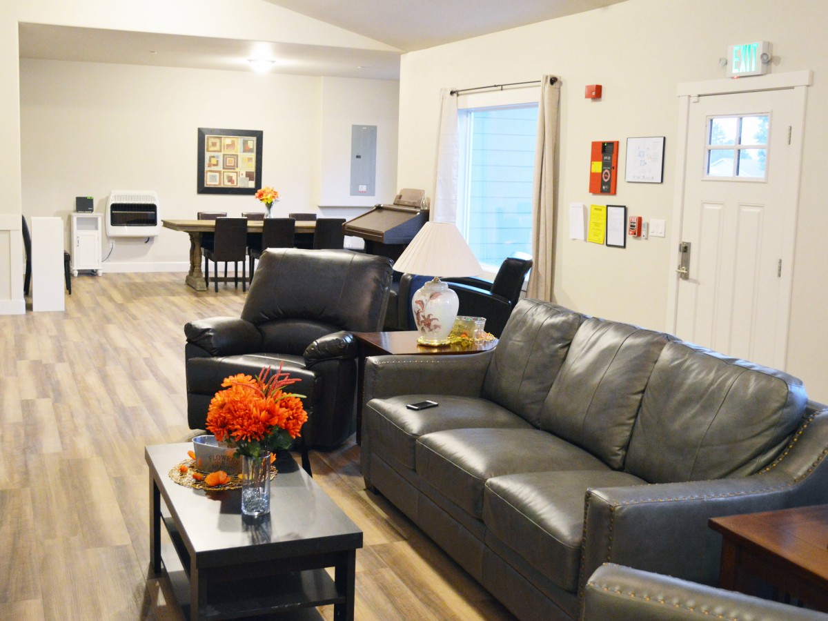 A modern living room with comfortable seating and stylish decor.