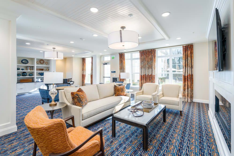 A modern living room with stylish furniture and decor.