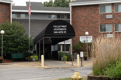 Entrance of Valley West Apartments with a welcoming canopy.