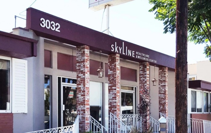 The exterior of a restaurant named Skyline, featuring a brick facade and an awning.