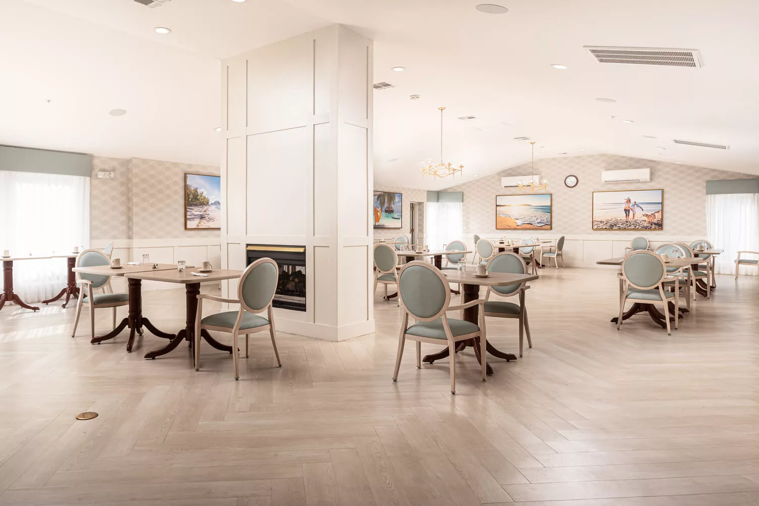 A modern and spacious dining area with elegant seating and tables.