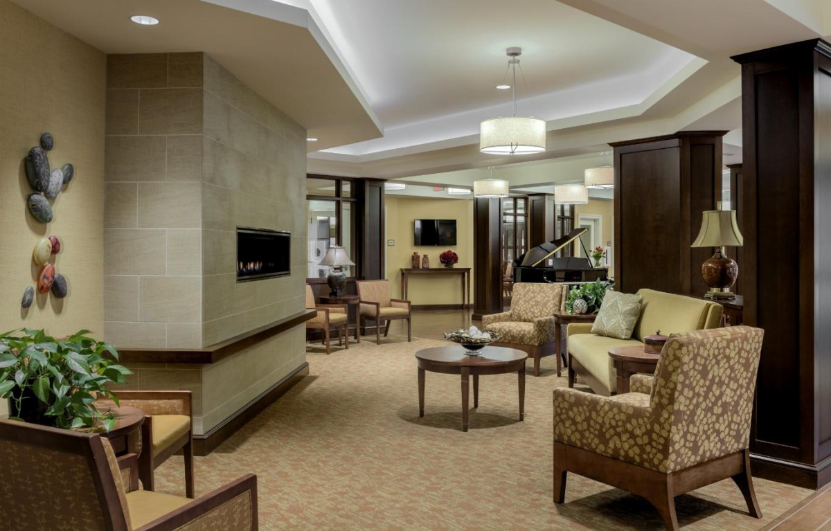 Modern lobby with comfortable seating and elegant lighting.
