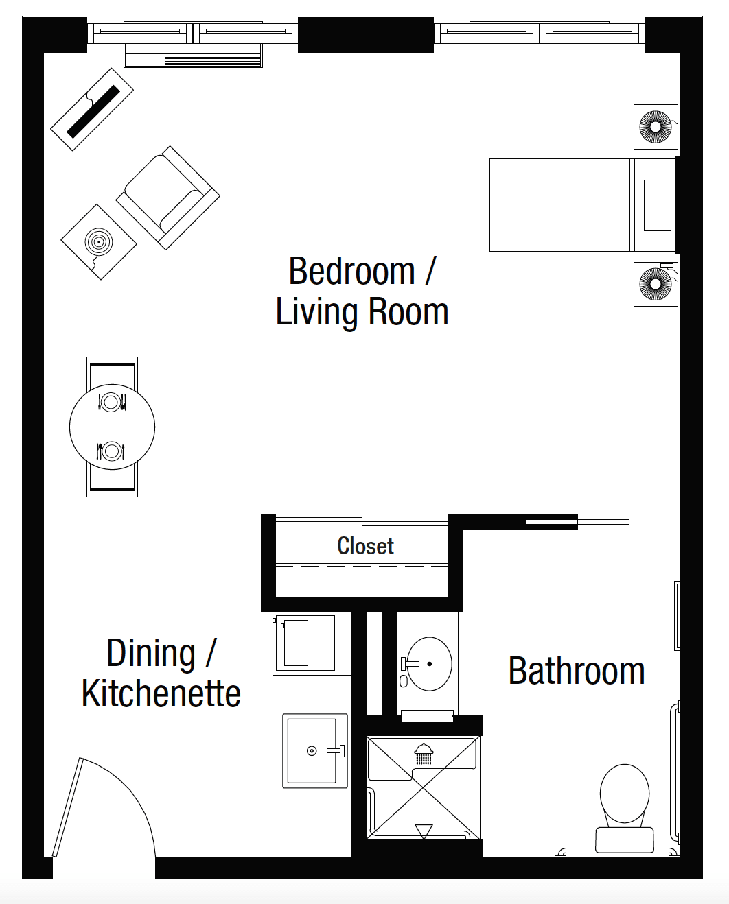 Floor plan of a studio apartment with separate areas for living, dining, and bathing.
