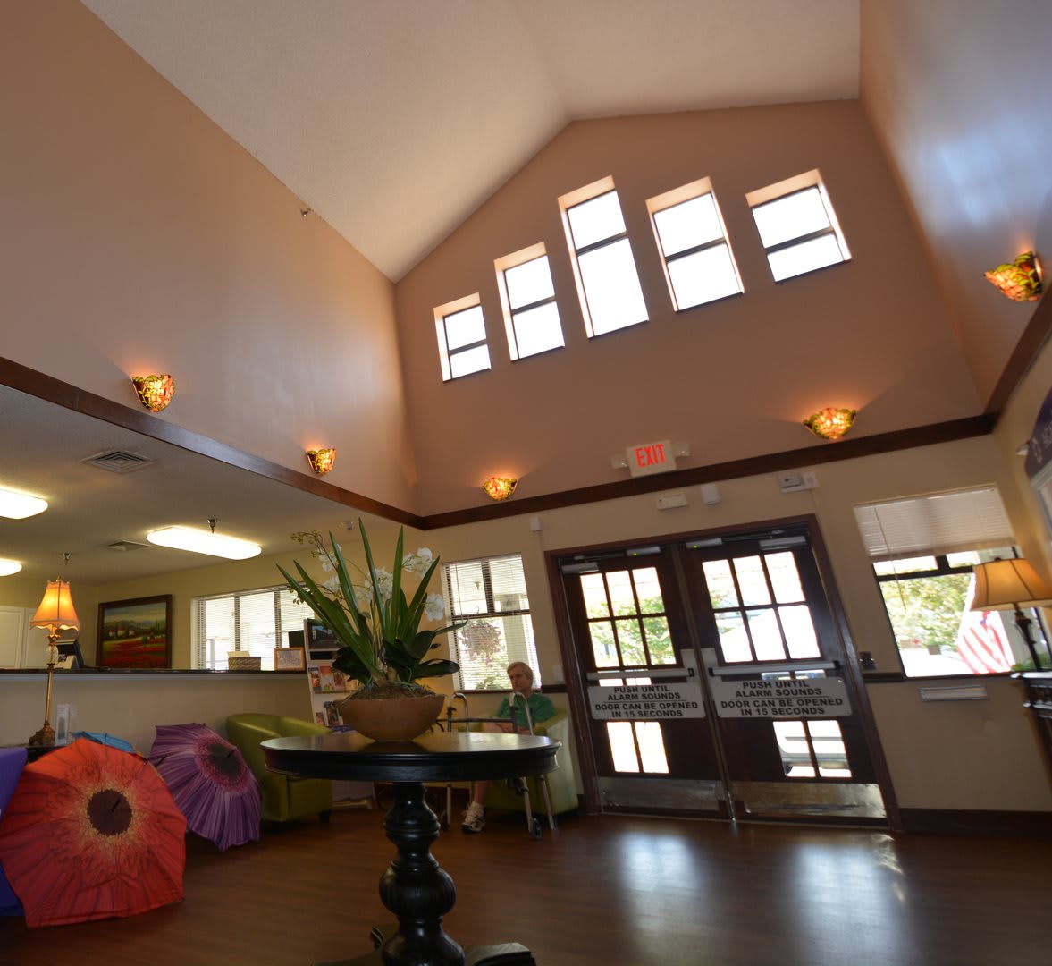 A welcoming lobby with high ceilings and ample natural light.