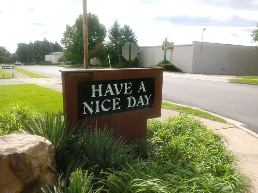 A cheerful message wishing everyone a nice day.