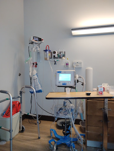 A clinical setting featuring essential medical equipment for patient care.