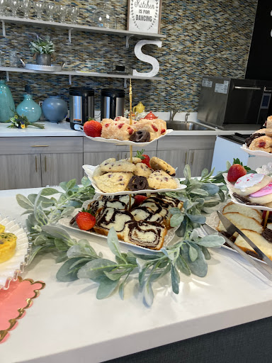 A delightful assortment of cookies and sweets displayed beautifully for an event.