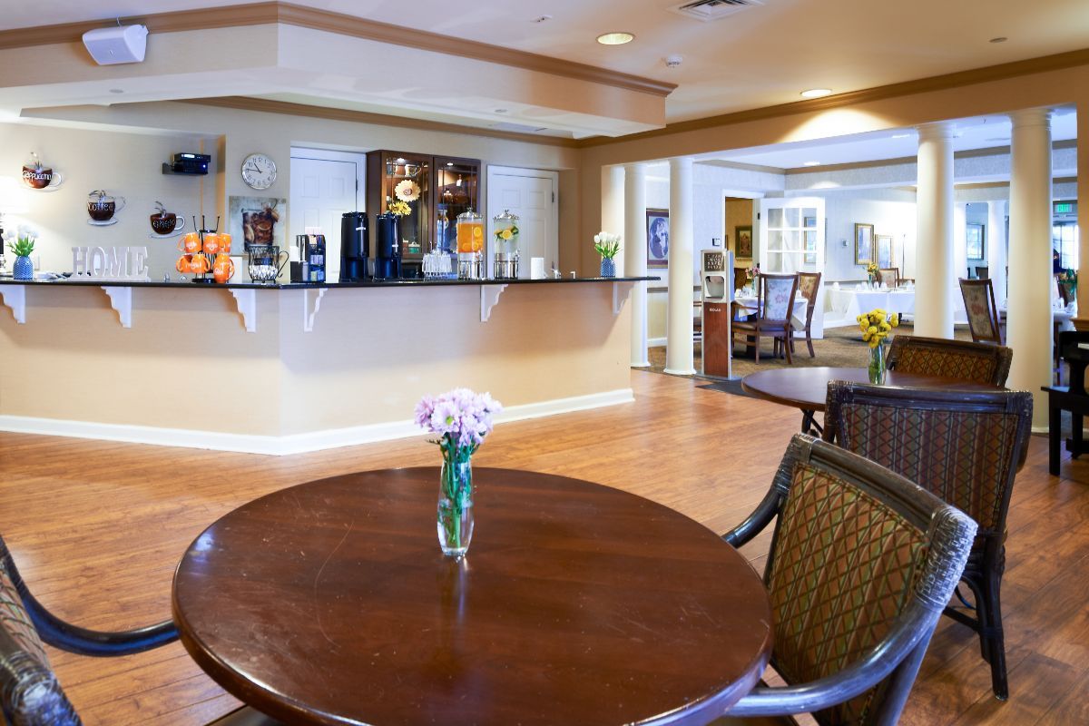 A cozy lobby with a seating area and reception desk.