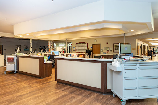 A modern hospital reception area with a clean and inviting design.