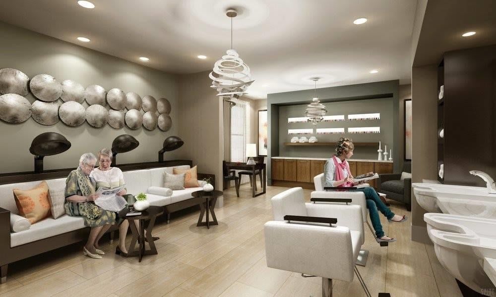 A modern salon with a comfortable waiting area and stylish decor.
