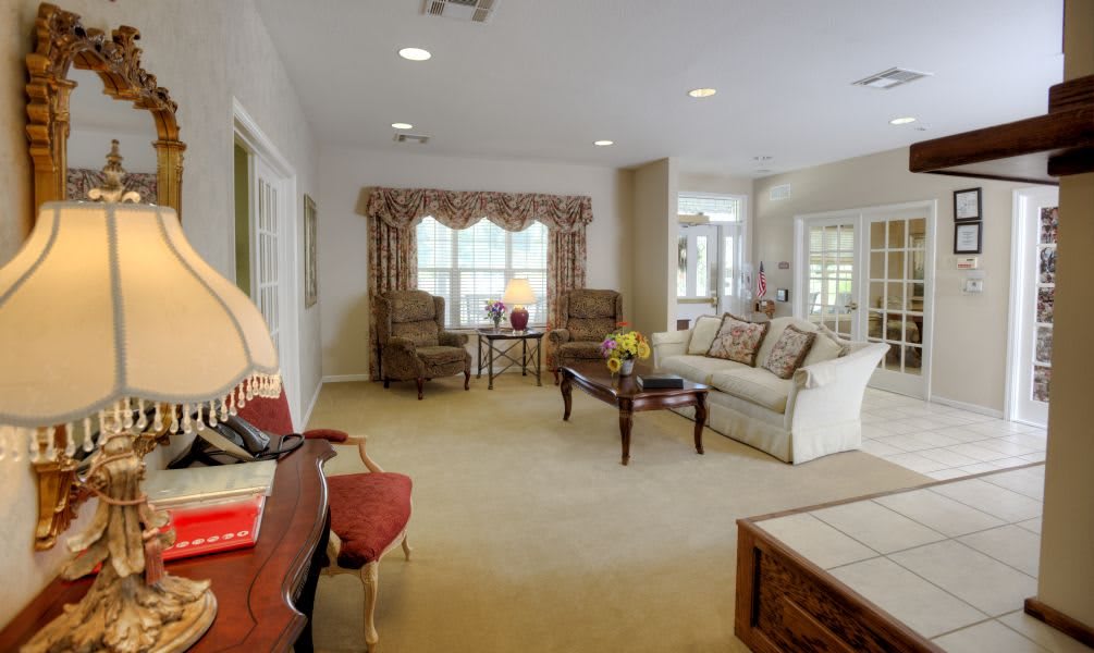 A traditional living room with comfortable furniture and elegant decor.