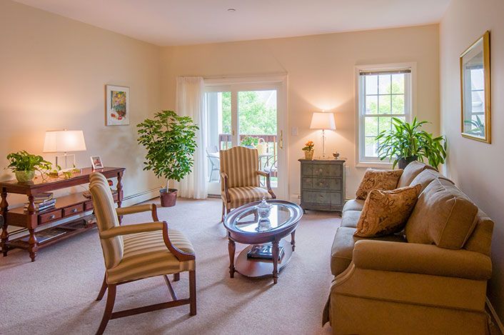 A cozy living room with comfortable seating and natural light.