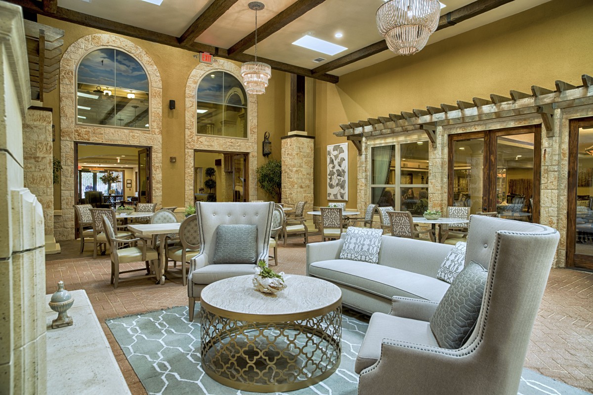 A luxurious lounge area with elegant seating and decor.