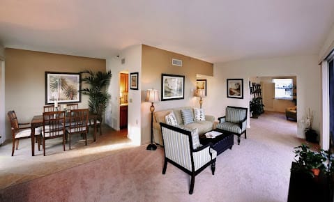 A cozy living room with elegant furniture and stylish decor.