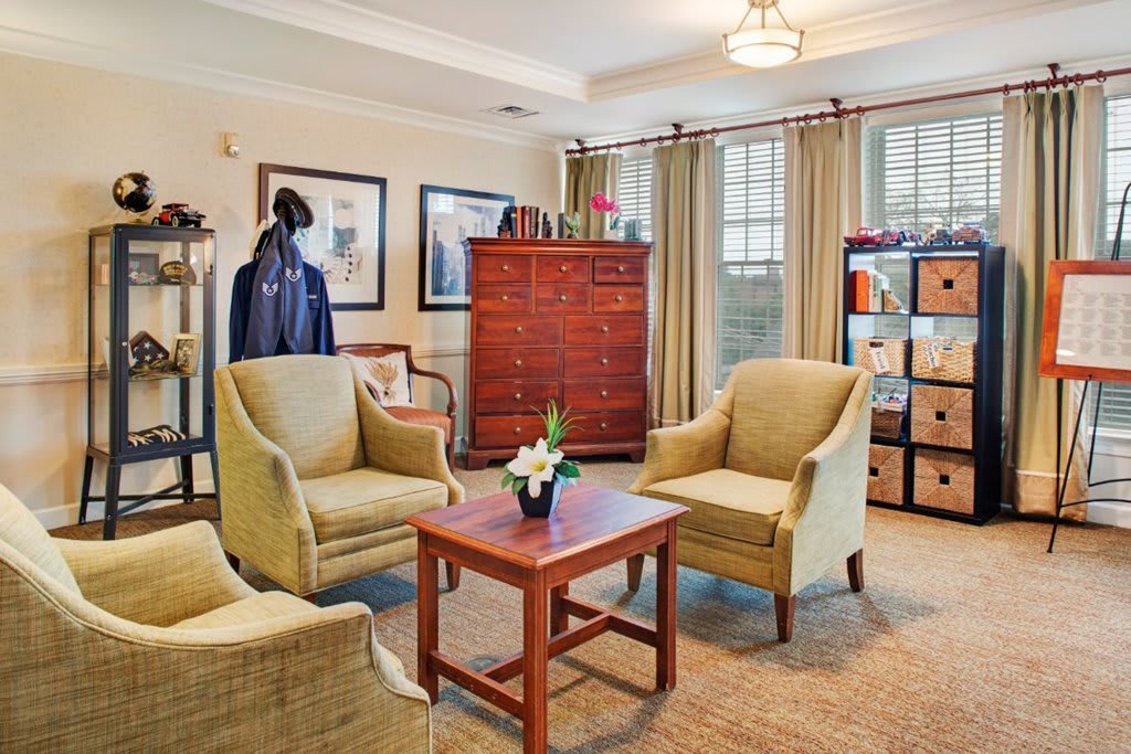 A cozy living room with comfortable chairs and tasteful decor.