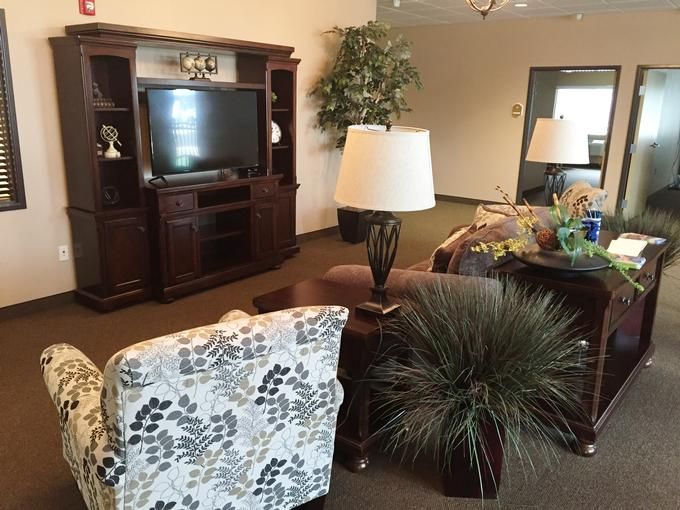 A cozy living room with comfortable seating and a television.