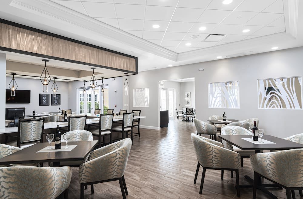 A modern dining area with elegant furniture and stylish lighting.