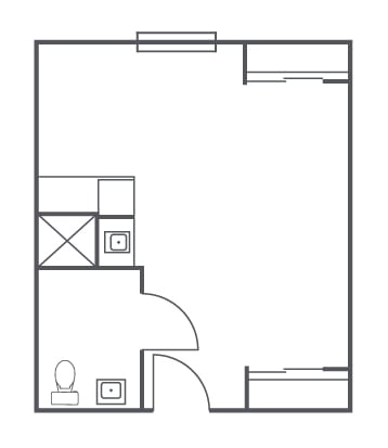A simple floor plan showing a one-room apartment with a bathroom and kitchen area.