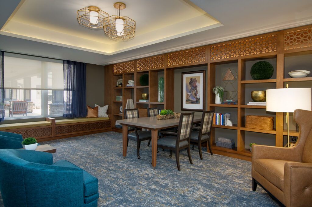 A modern living and dining area with wood furnishings and elegant decor.