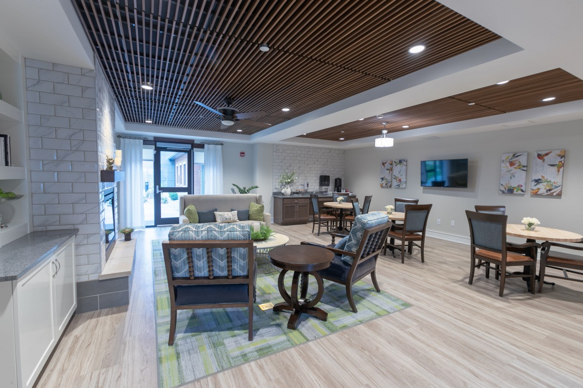 A modern lounge with a comfortable seating arrangement and stylish decor.