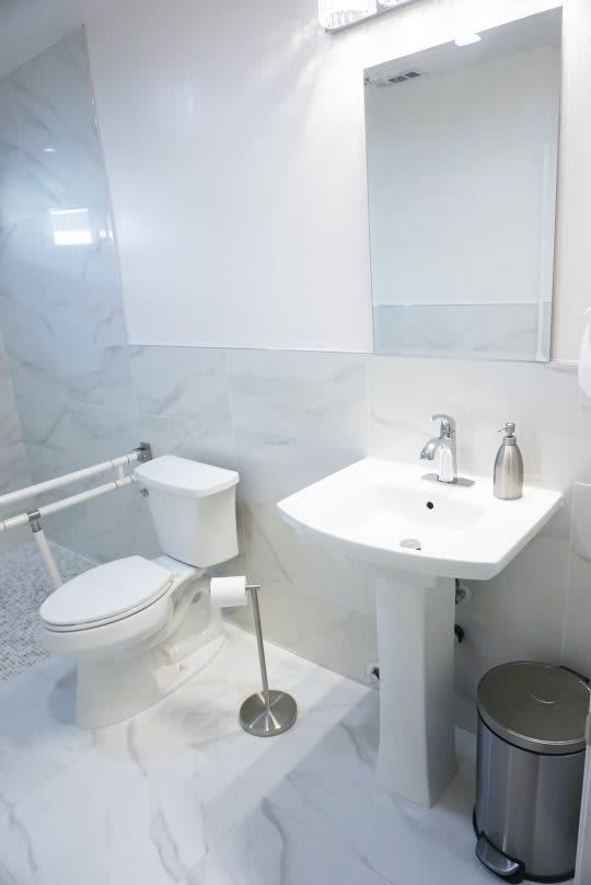 A clean and modern bathroom with accessible features.