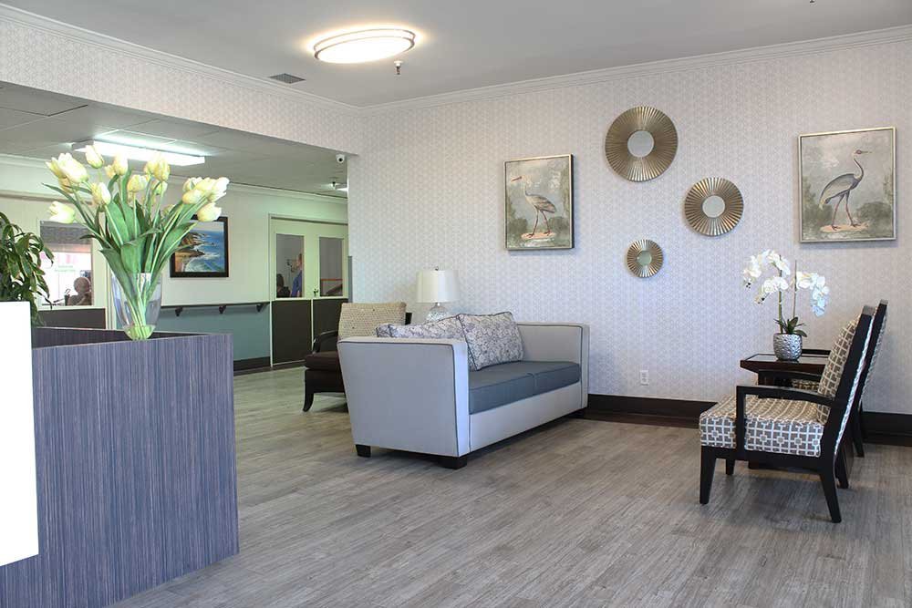 A modern lobby area with stylish furniture and decor elements.