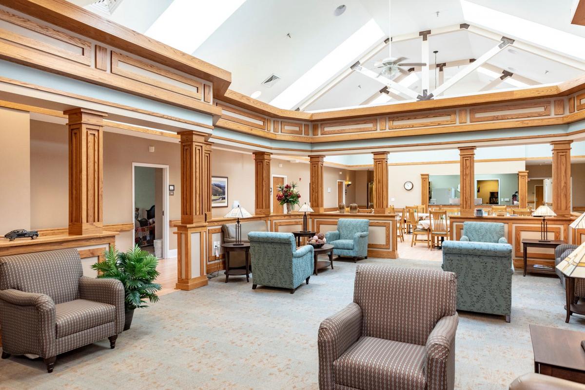 A spacious interior waiting area with comfortable seating and abundant natural light.
