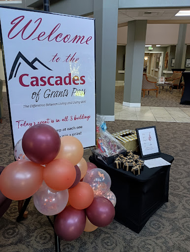 A warm welcome to the Cascades of Ontario event, complete with decorative balloons and a registration table.