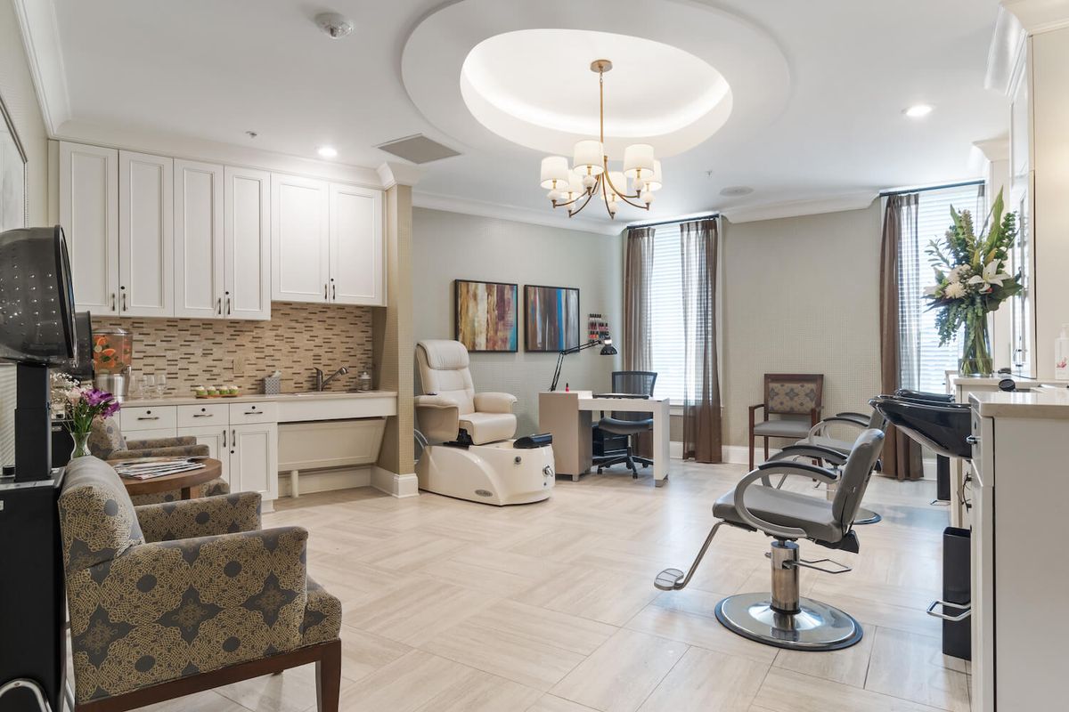 A modern clinic interior with comfortable seating and stylish decor.