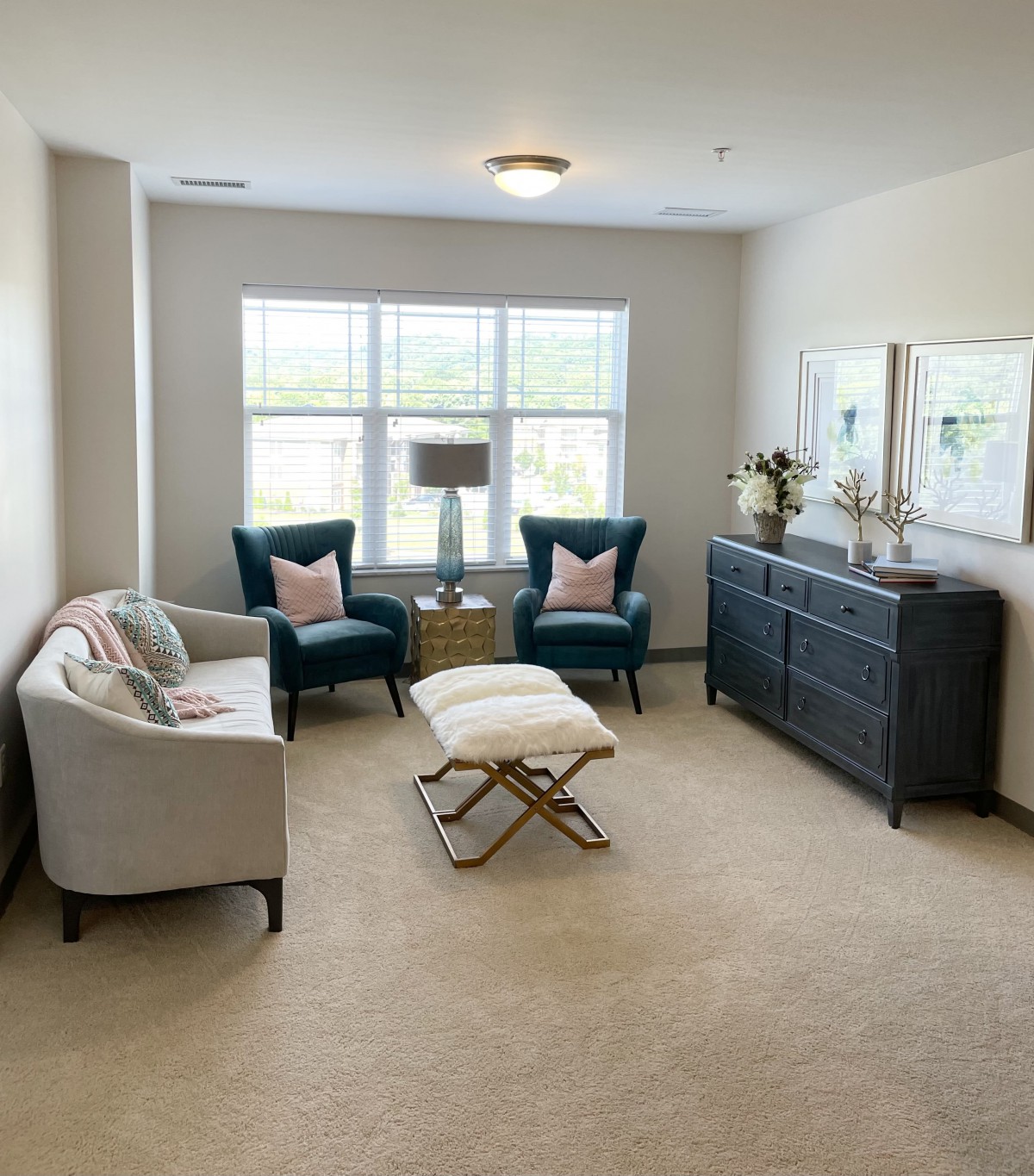 A cozy living room with modern furniture and natural light.