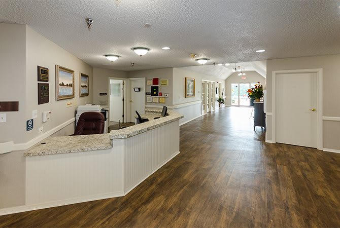 A modern reception area with a spacious hallway and stylish interior design.