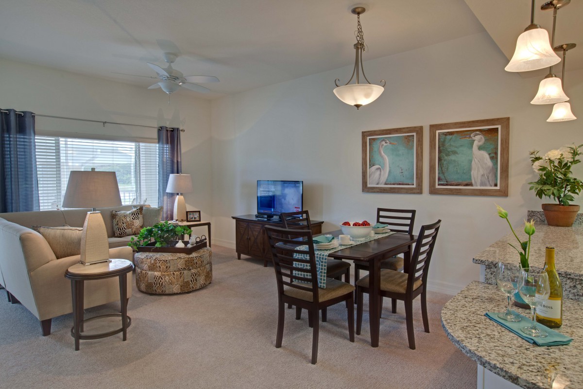 A cozy living and dining area featuring elegant furniture and tasteful decor.