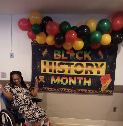 A vibrant celebration of Black History Month, complete with festive decorations and joyful participation.