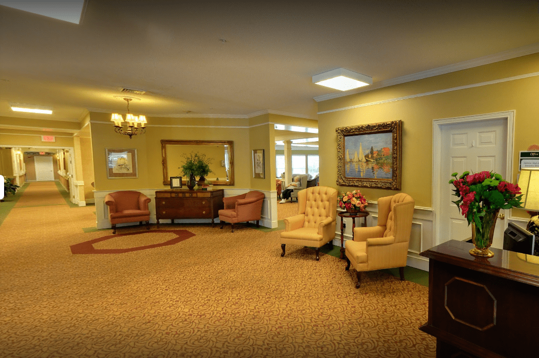 A cozy living room with comfortable seating and elegant decor.