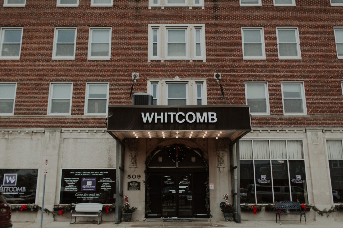 The entrance of the Whitcomb hotel with a prominent awning.