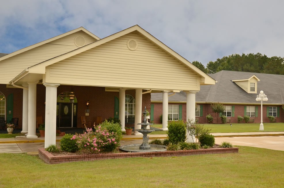 A suburban house with a well-maintained front yard and garden.