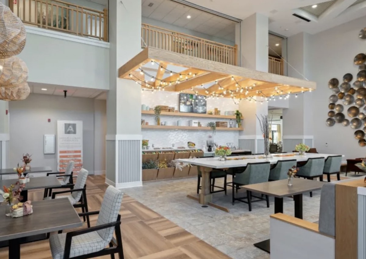 A modern dining area with stylish lighting and contemporary decor.