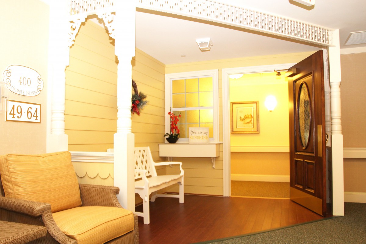 A warmly lit lobby area with cozy seating and elegant decor.