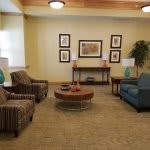 A cozy living room with comfortable seating and warm decor.