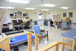 A therapy room equipped for rehabilitation exercises.