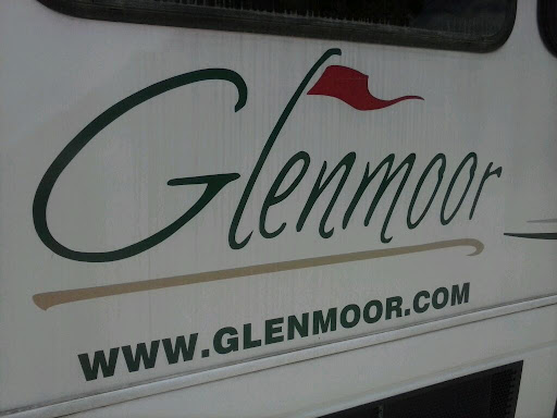 A sign displaying the name 'Glenmoor' along with its website.