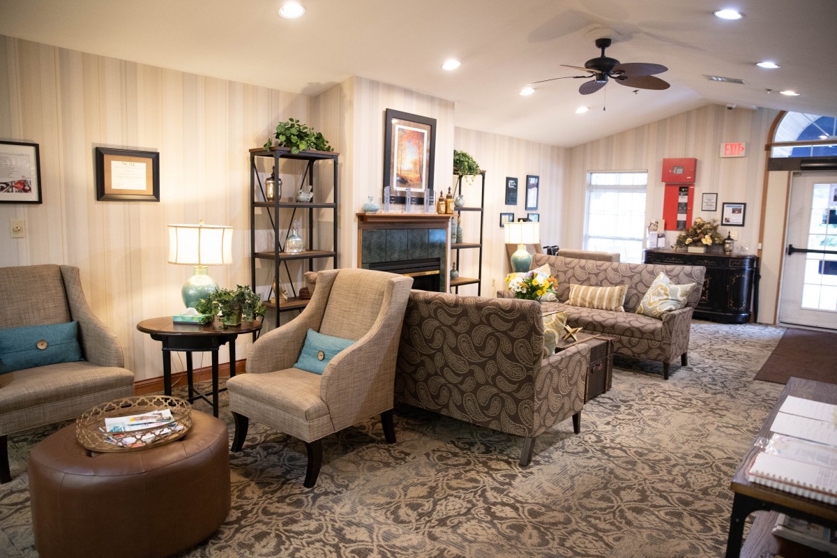 A cozy and well-decorated living room with comfortable seating and stylish decor.