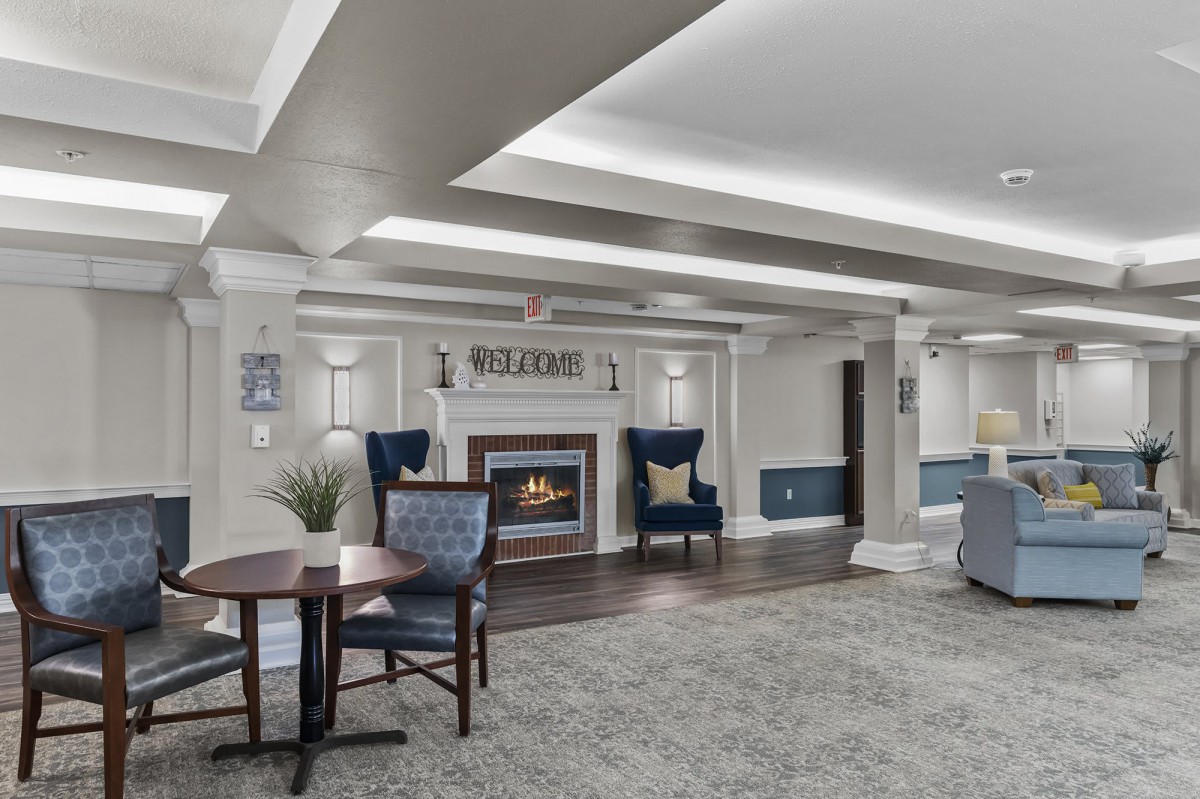 A welcoming lobby area with comfortable seating and a fireplace.