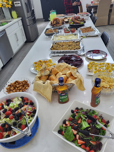 A vibrant spread of delicious dishes and snacks set up for a festive gathering.