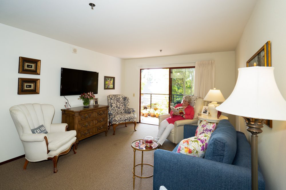 A cozy living room with comfortable seating and a television.