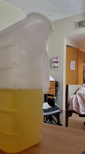 A close-up of a beverage in a hospital room.