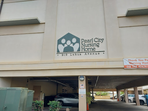 Signage for Pearl City Nursing Home located in a parking garage.